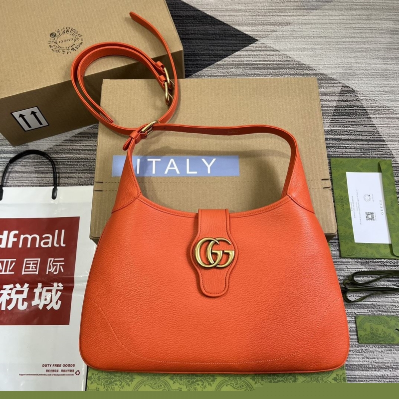 G*u*i top handle bags